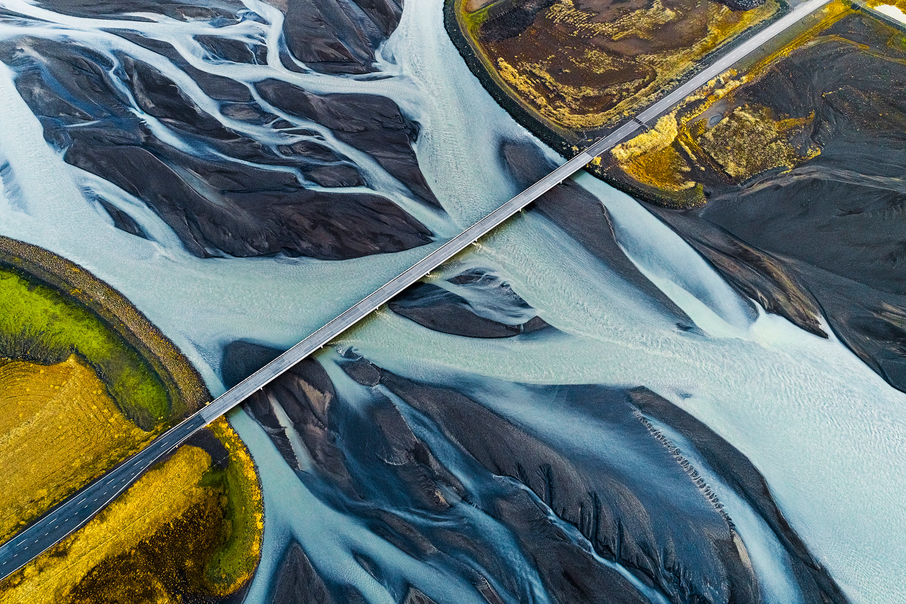 Aerial view of bridge over river.