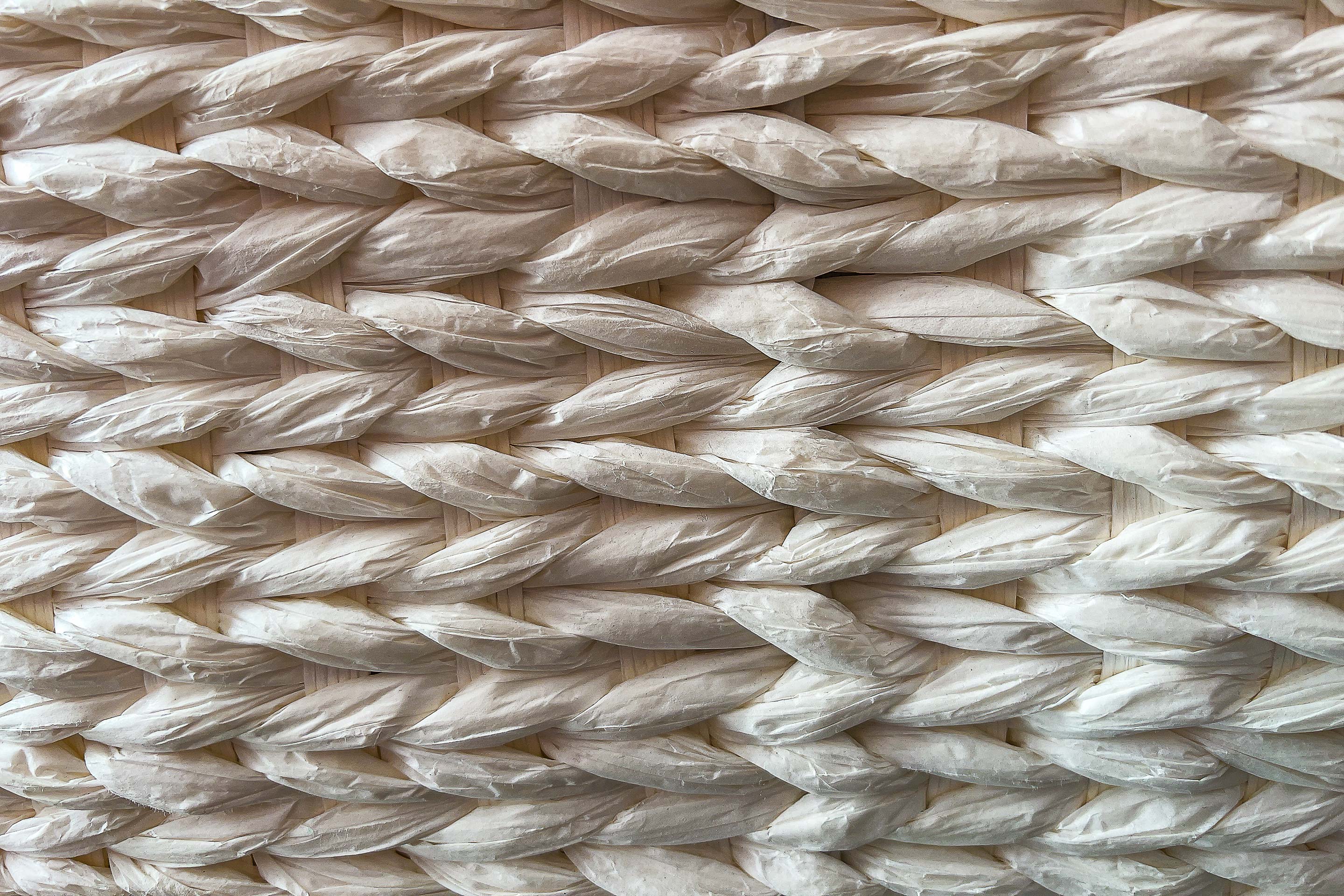 White wicker is woven together representing connectivity.