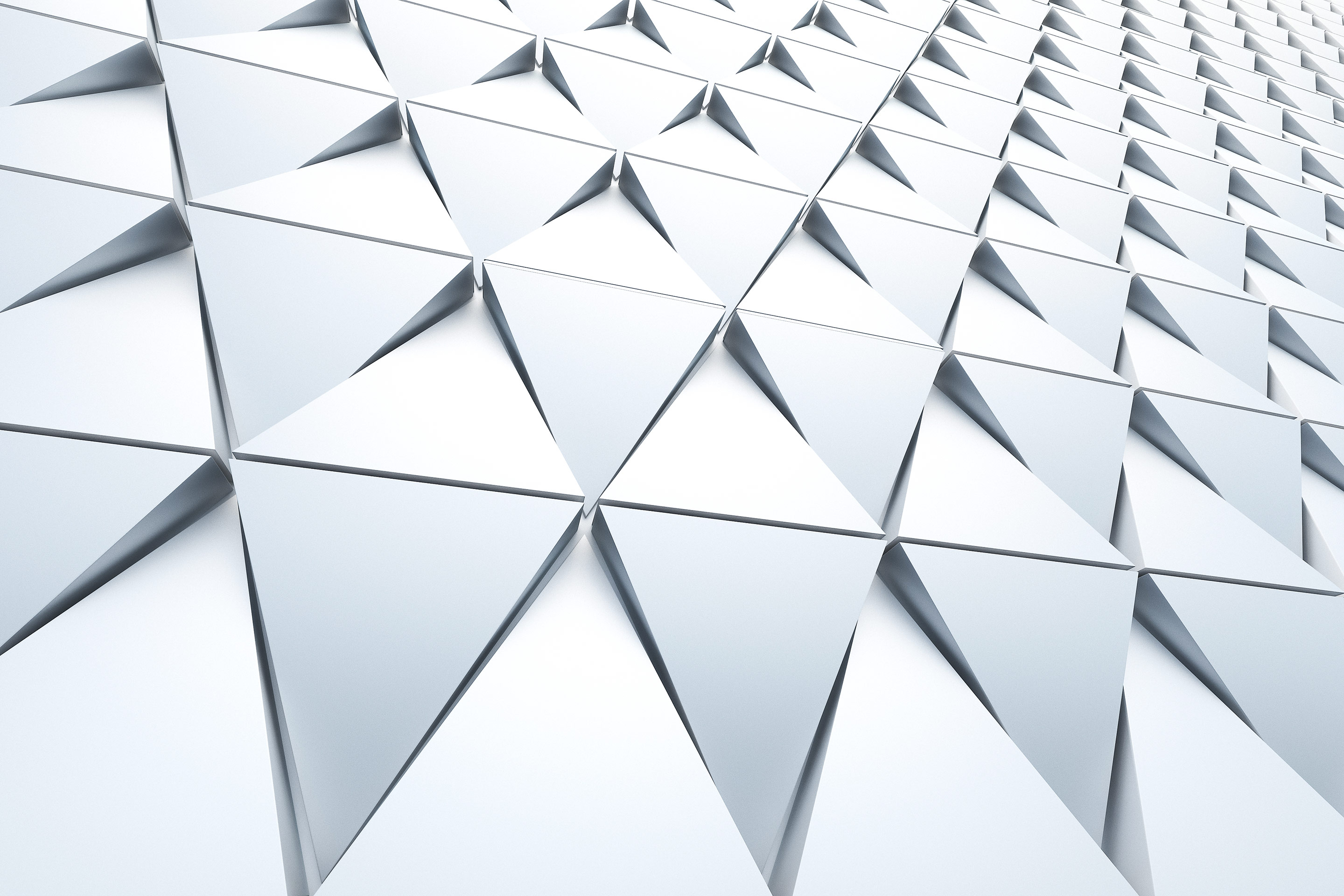 Layers of triangle shapes connect together to form a wall of symmetry