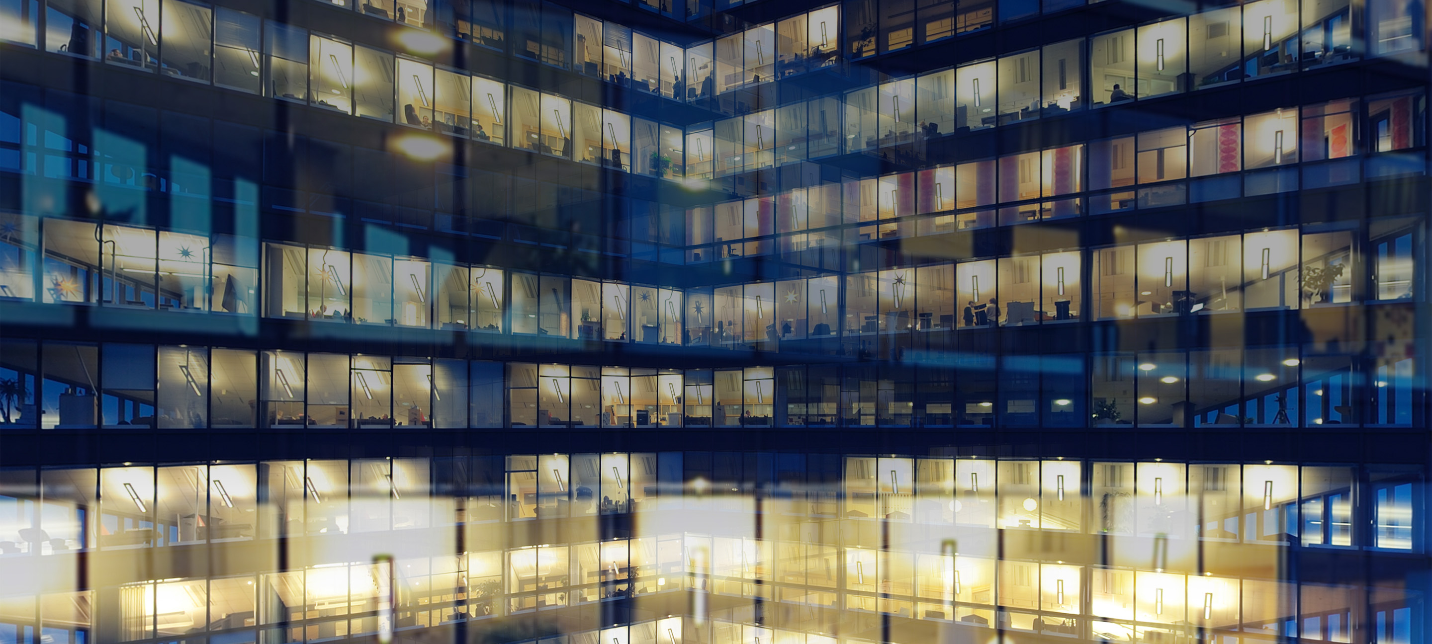 A building through a reflection of glass