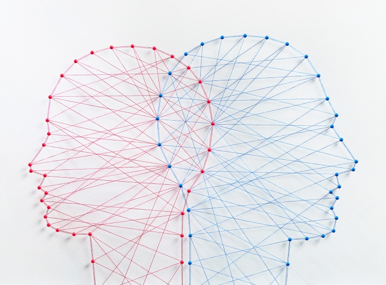 Outlines of heads connected by threads.