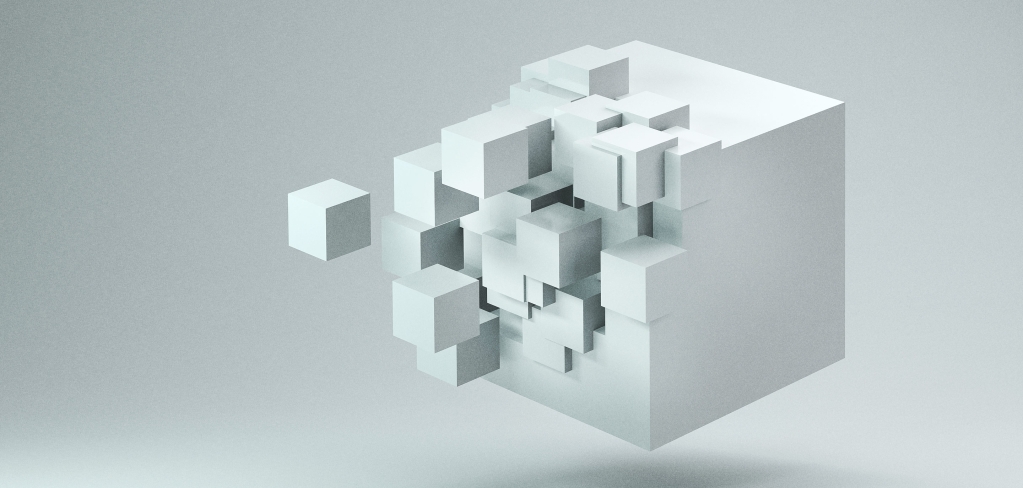A curious white cube is partially constructed as it floats on a white background. It&#39;s either dissolving into smaller white 3D cubes, or being assembled by them.