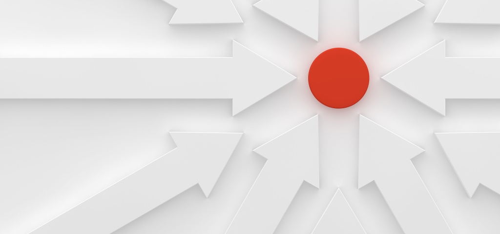 A white image of a series of arrows all pointing towards a red center as a metaphor for investing goals