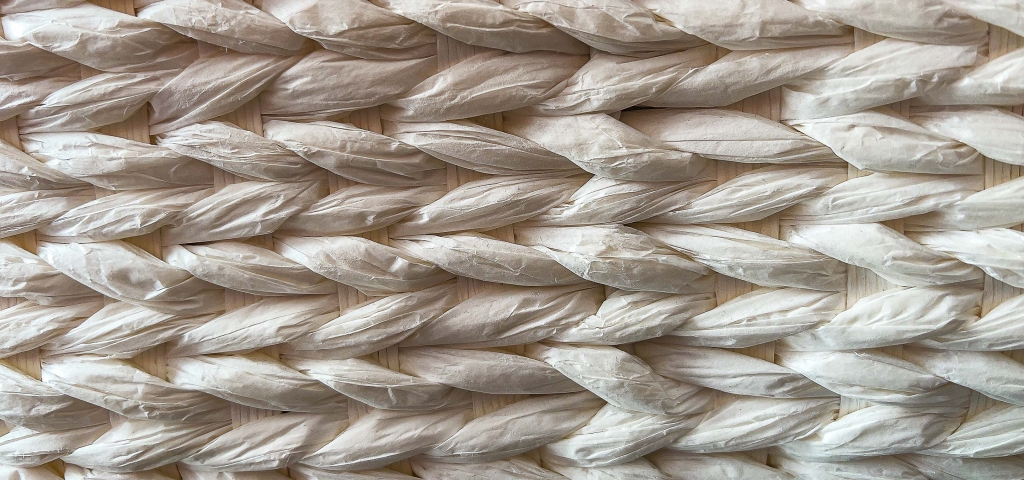 White wicker is woven together representing connectivity.