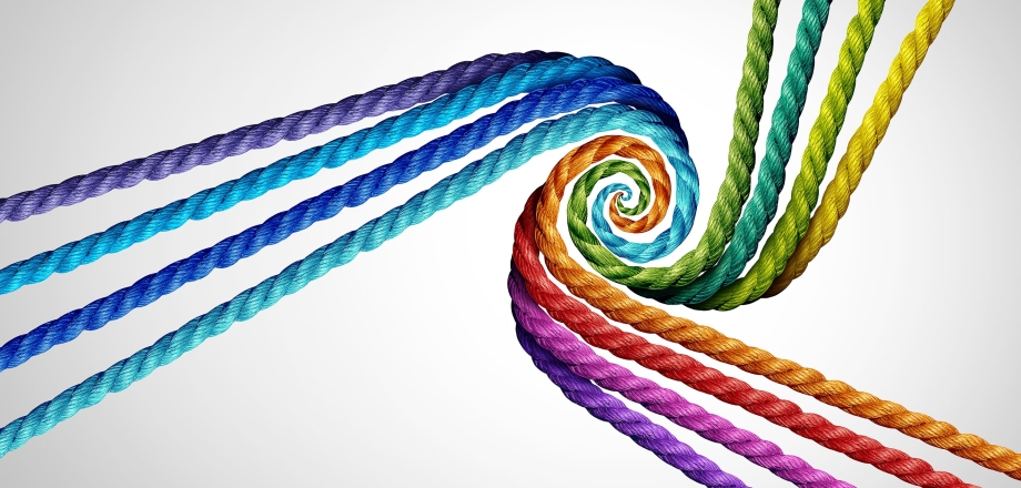 A rainbow of colored ropes twist together as a metaphor for interactivity.