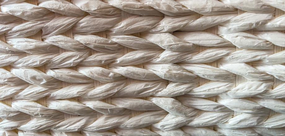 White wicker is woven together representing connectivity.