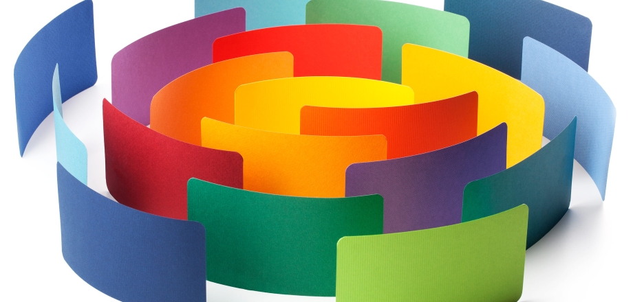 Colorful rectangles circle together on a white background  showing the power of integrating different ideas.
